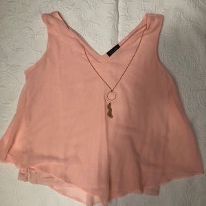 Light pink blouse with attached necklace